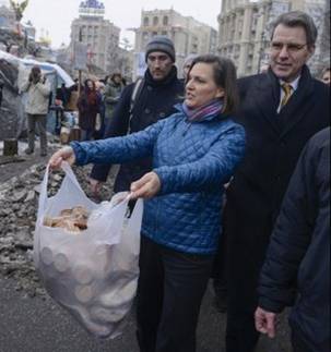 Victoria Nuland, who was planning the Ukrainian coup and civil war at the U.S. State Department, hands out cookies to protestors in Kiev.